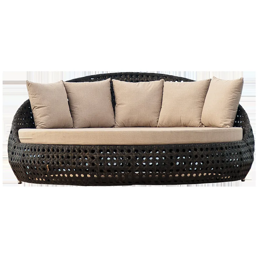 Round rattan daybed sofa with beige cushions